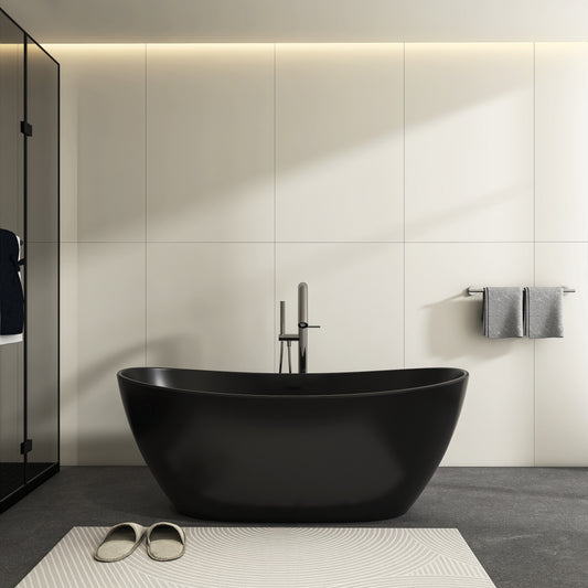 65" Stone Resin Freestanding Bathtub, Matte White — installed in a bathroom