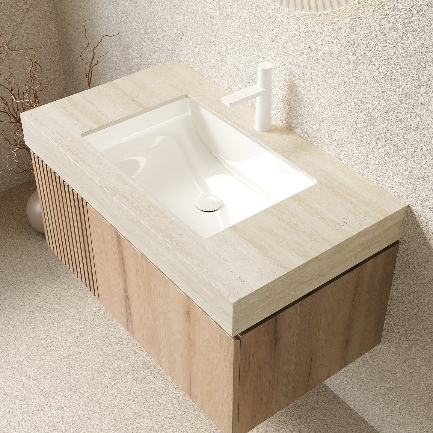 Bathroom vanity with a white sink and wooden cabinet.