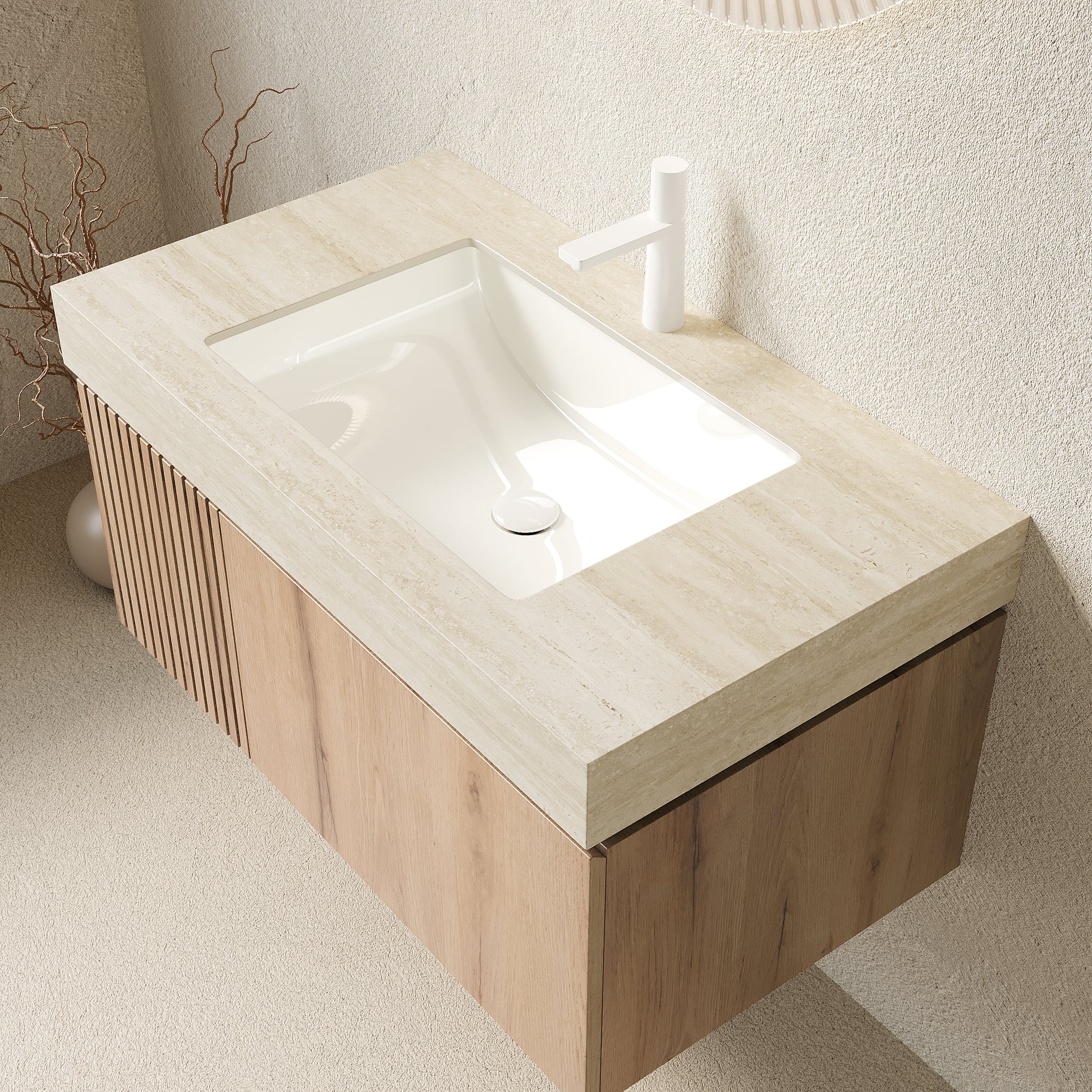Bathroom vanity with a white sink and wooden cabinet.