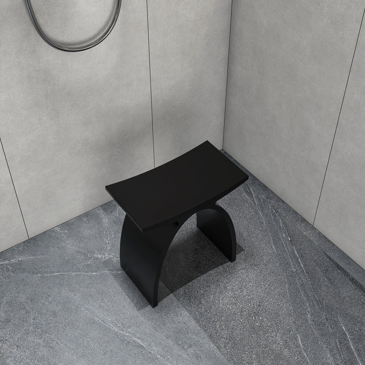 matte white shower stool next to a bathtub