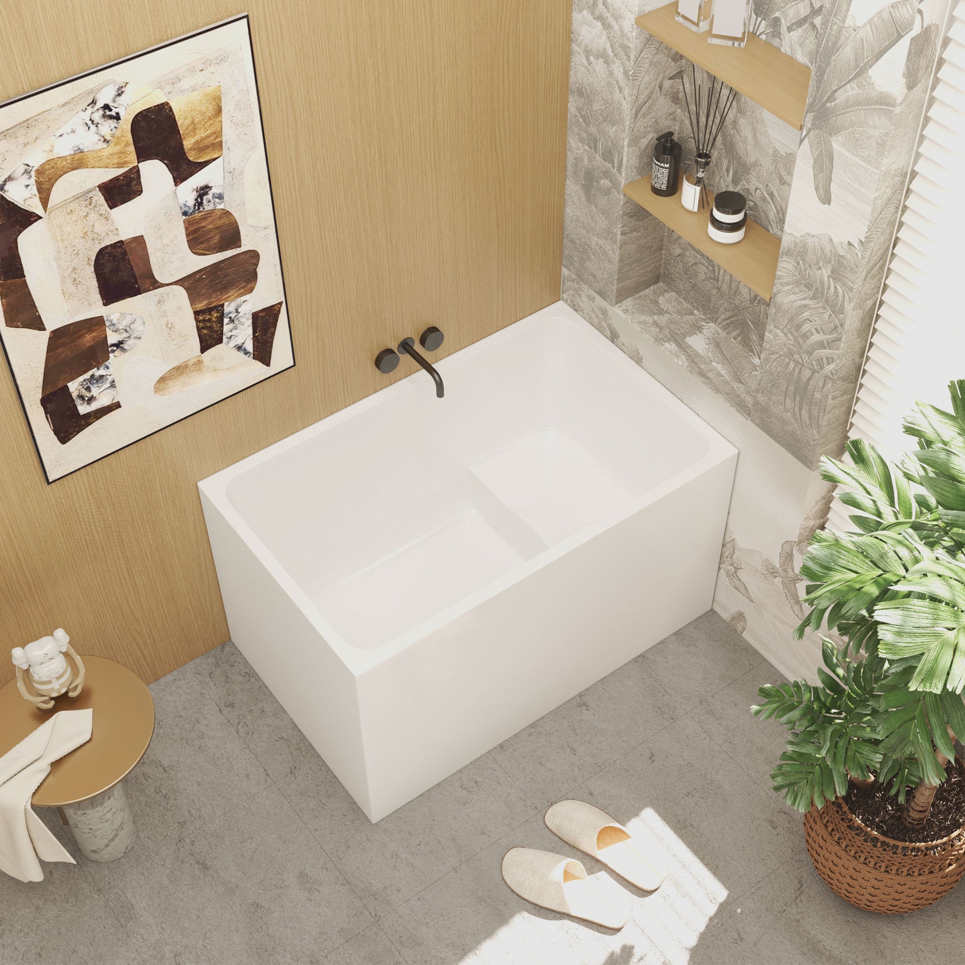 Modern bathroom with a white bathtub, plant, and abstract art on the wall.