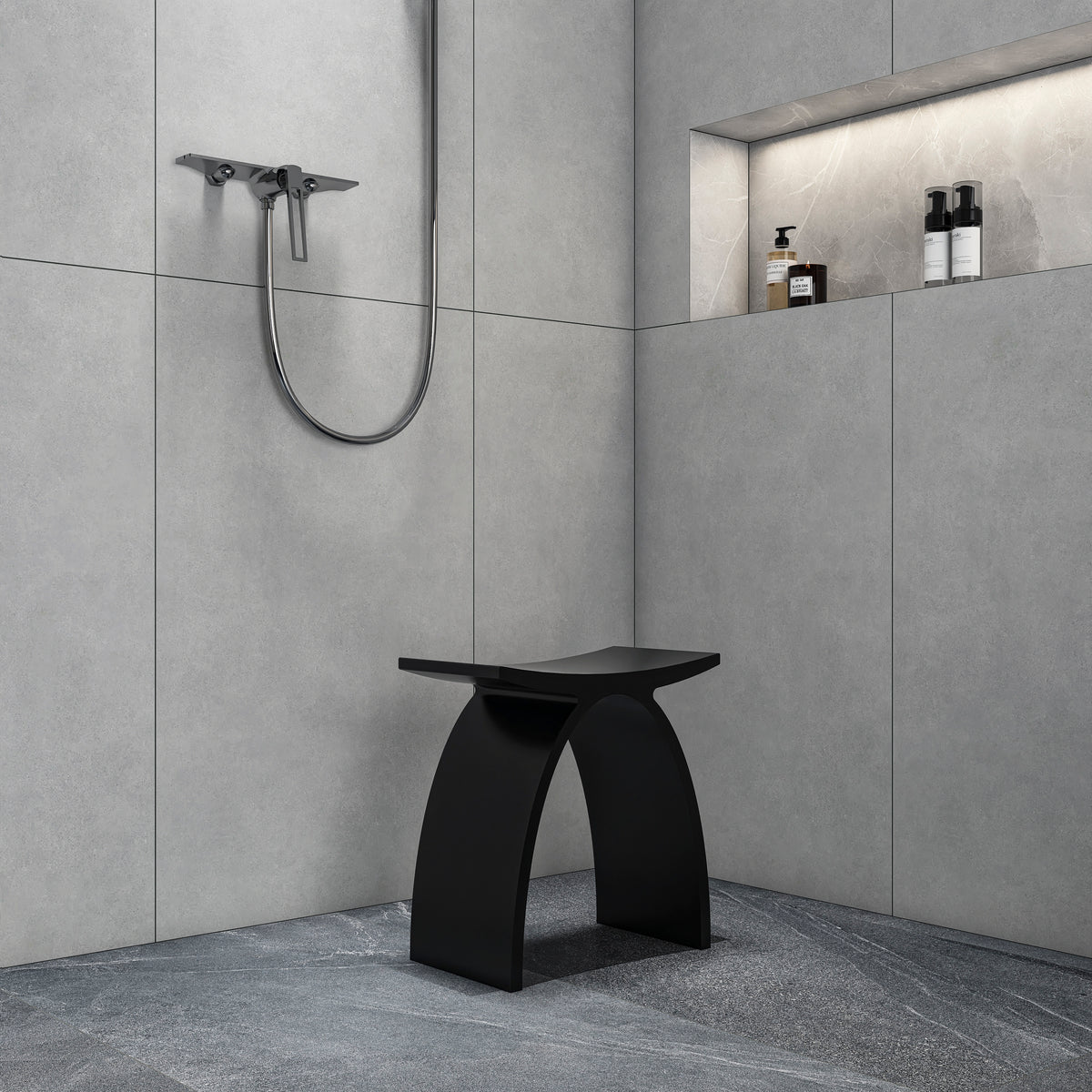 matte black compact shower stool in a small bathroom