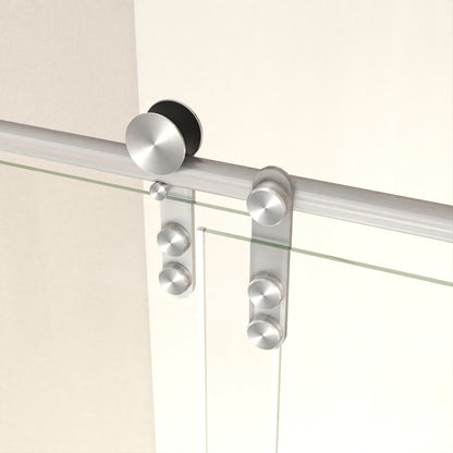 glass shower door with brushed nickel trim in a modern bathroom