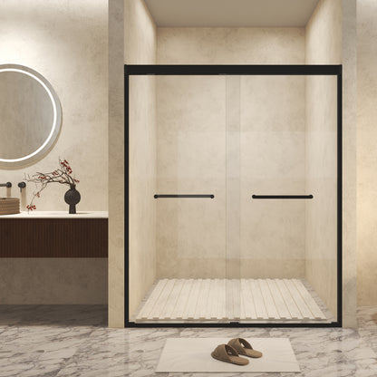 Modern bathroom with a glass shower enclosure, sink, and decorative elements.
